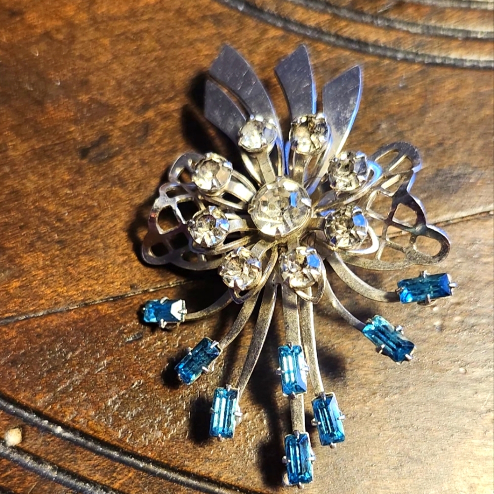 Vintage MCM Aqua Blue Rivet Set Rhinestone Silver Tone Brooch Filagree Bow